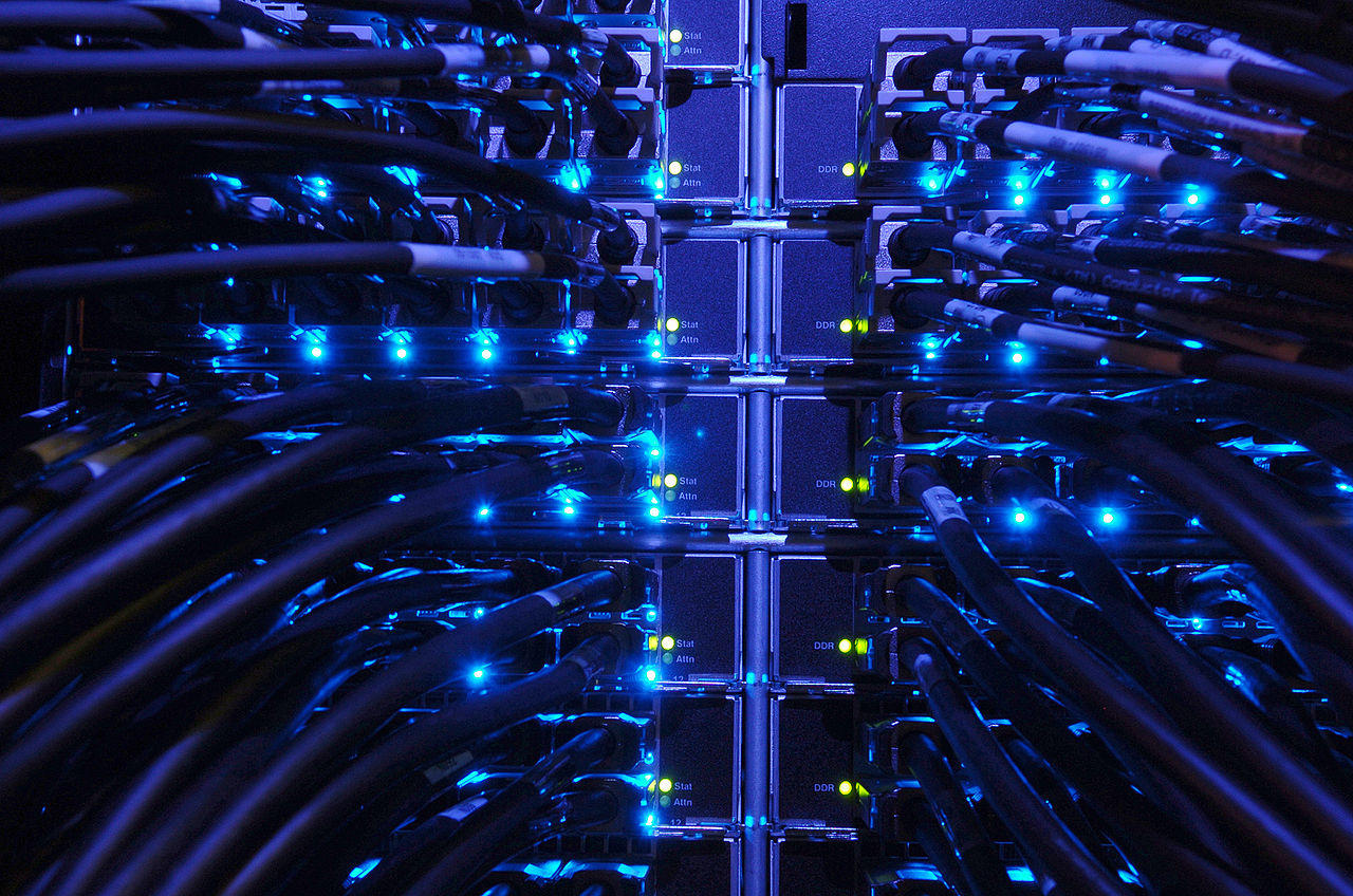 Technology news overview with multiple screens and data displays